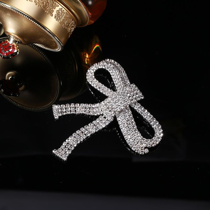 Diamanté Bow Silver Brooch